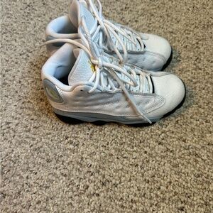 Jordan White Sneakers with Black and Gold Details